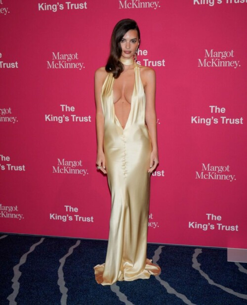 Emily Ratajkowski commands attention at The King's Trust 2024 Gala, flaunting her perfect, braless breasts in a daring low-cut dress. 